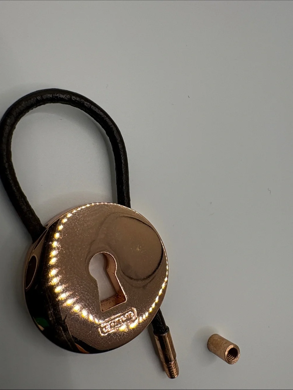 Coach Rose Gold Tone and Brown Leather Strap Charm keychain